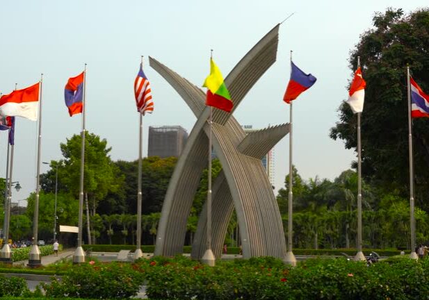 Viet Nam, Ho Chi Minh City, Flags Of Association of Southeast Asian Nations waving from Hoang Van Thu Park, Tan Binh District.