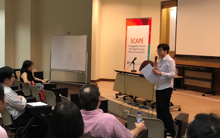 Ms Yong Yik Wei, Director of MTI's Economics Division, speaking at the pitching session.