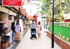 Photo: ‘Family strolling past heartland shops’ by Filbert Koung from SRN’s SG Photobank