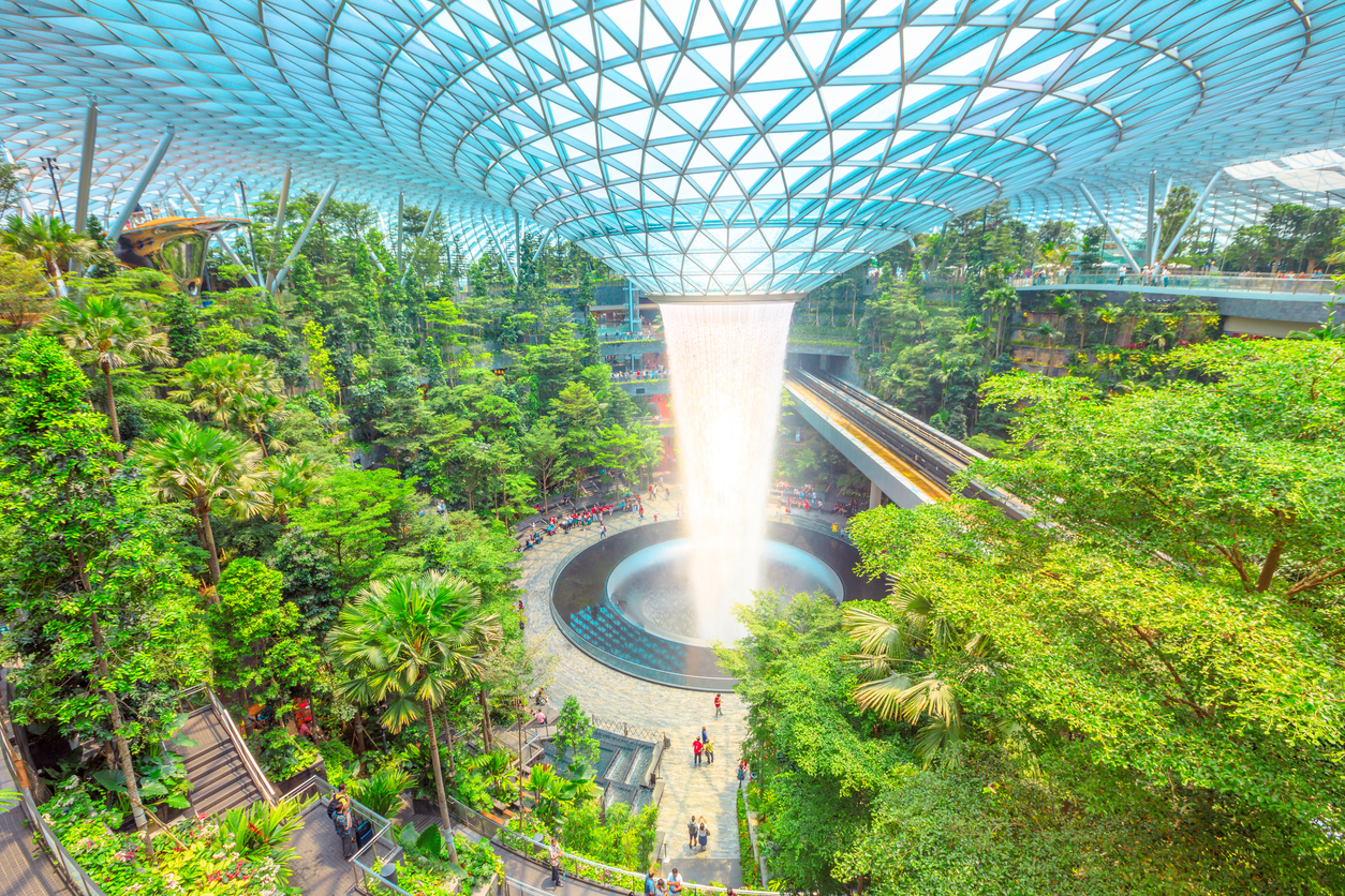Singapore - Aug 8, 2019: aerial view from Canopy Park of Rain Vortex, the world's largest indoor waterfall surrounded by a four-story terraced forest in Jewel Changi Airport opened on April 2019.