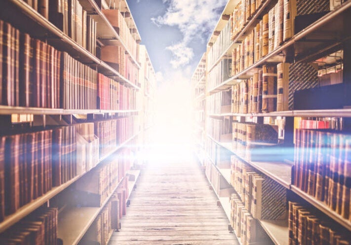 Close,Up,Of,A,Bookshelf,Against,Wooden,Bridge,At,Countryside